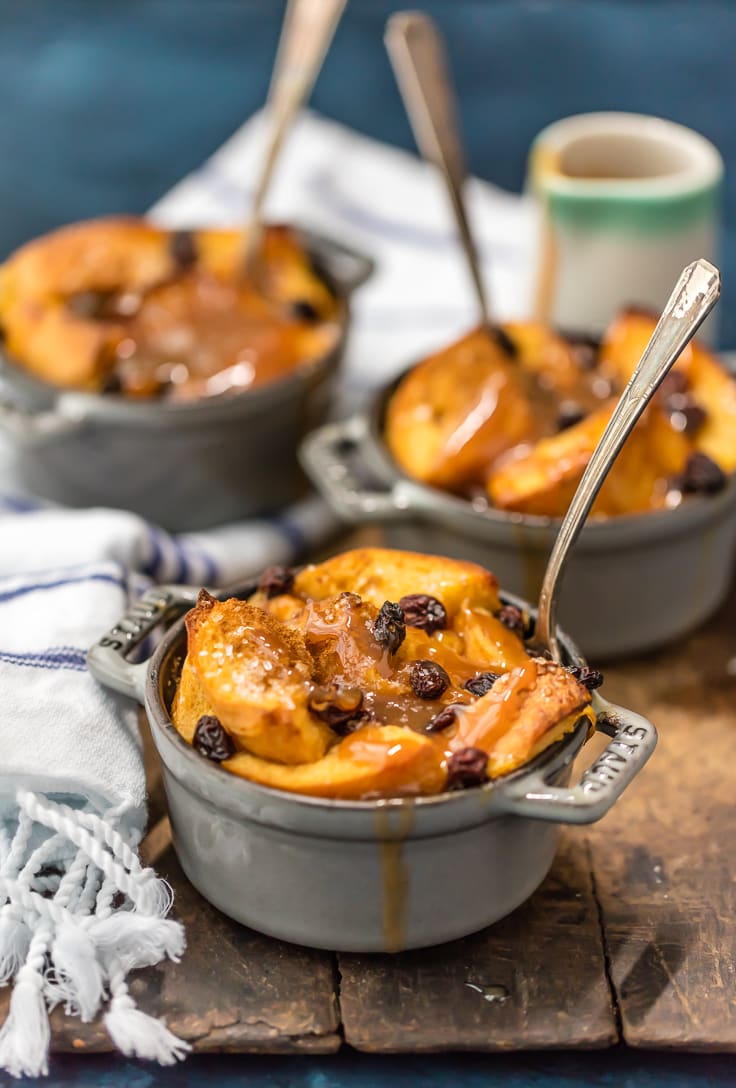 ramekins of Irish bread pudding with whiskey caramel sauce