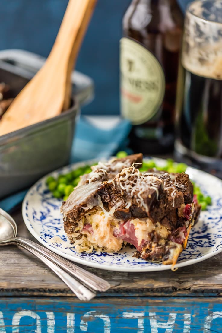 We LOVE this Loaded Reuben Casserole every St. Patrick's Day! Such an easy comfort food recipe loaded with corned beef, rye bread, sauerkraut, swiss cheese, and so much more!