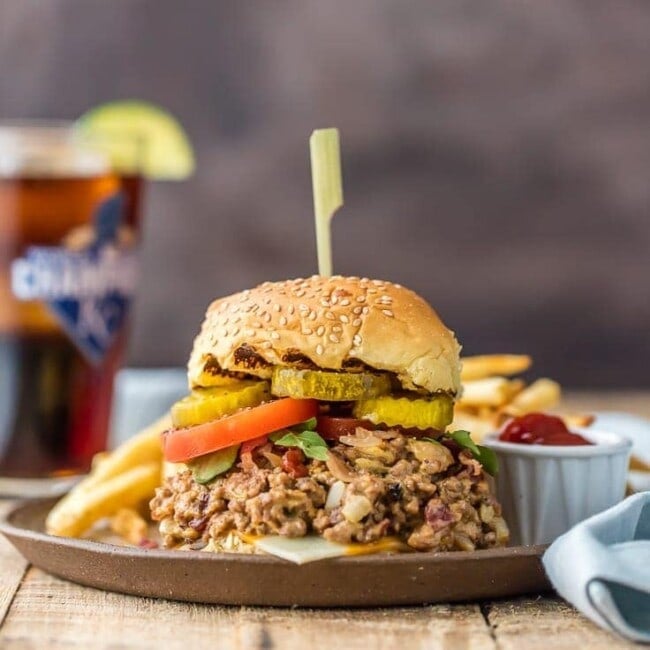 Wow the entire family with Slow Cooker Bacon Cheeseburger Sloppy Joes! SO EASY, creamy, delicious, and loved by all! This is our favorite weeknight meal we can throw in the crockpot and forget about!