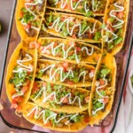 steak and egg tacos in a baking dish