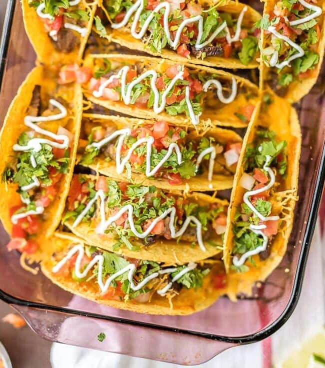 Baked Steak and Eggs Breakfast Tacos are perfect for a crowd! Baked Tacos are super easy, melty, cheesy, and delicious! Just the right amount of spice. A FAMILY FAVORITE!