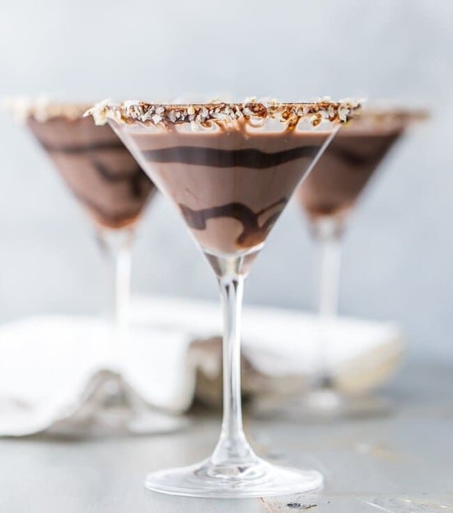 This German Chocolate Cake Martini is the perfect dessert cocktail! Tastes like you're taking a bite out of your favorite cake, in martini form! SO EASY and delicious!