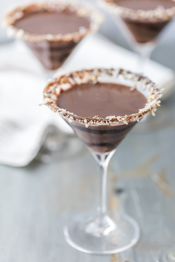 cocktail glass rimmed with toasted coconut holding a Chocolate Martini