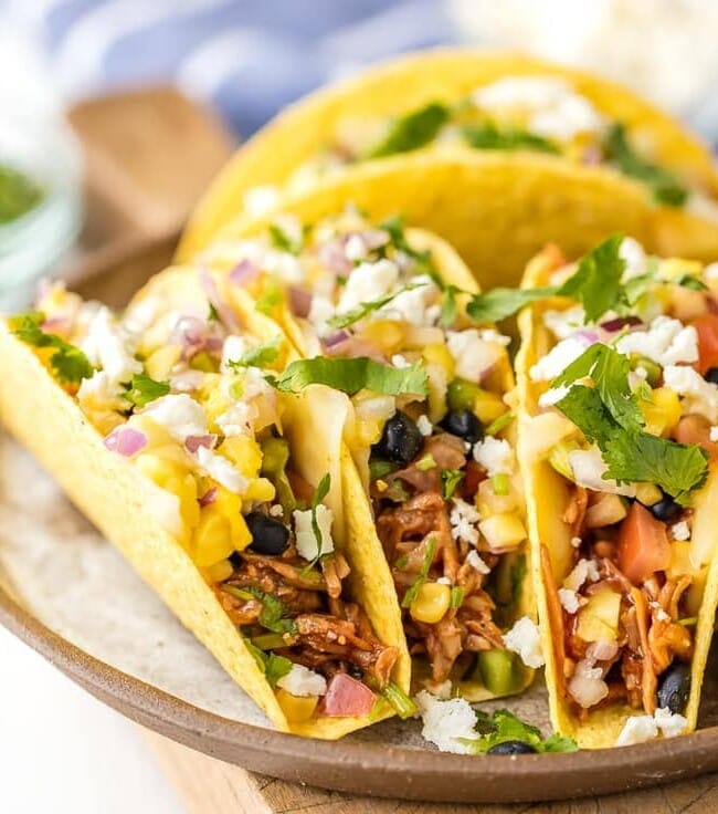 platter of bbq chicken tacos made in a slow cooker