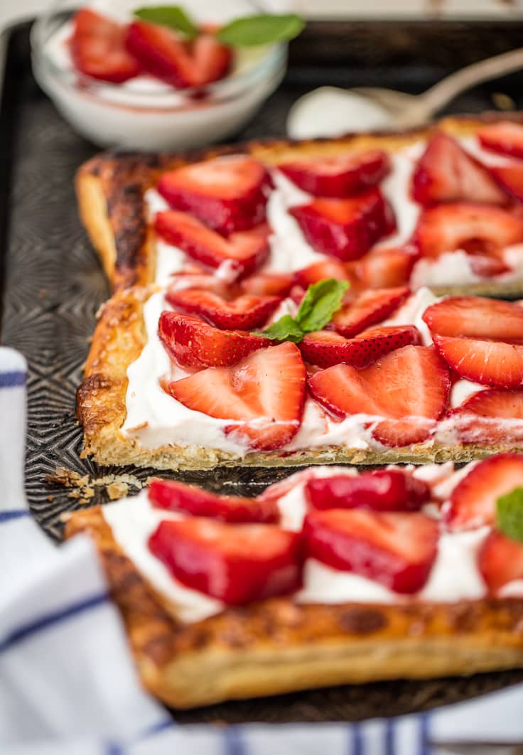 puff pastry tart topped with mascarpone and strawberries