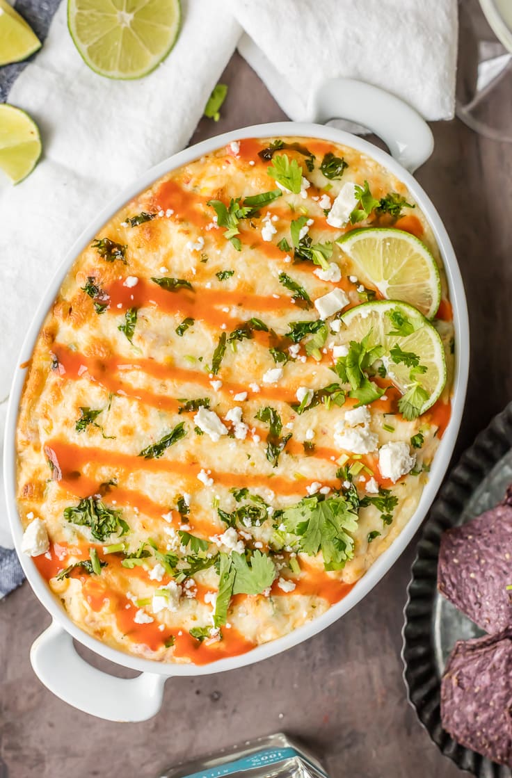 This MEXICAN STREET CORN DIP RECIPE is our favorite Hot Corn Dip! This Mexican Street Corn Recipe is a great way to celebrate Cinco de Mayo! Everything you love about spicy Mexican Dip with a cheesy baked street corn twist . BEST PARTY DIP EVER.