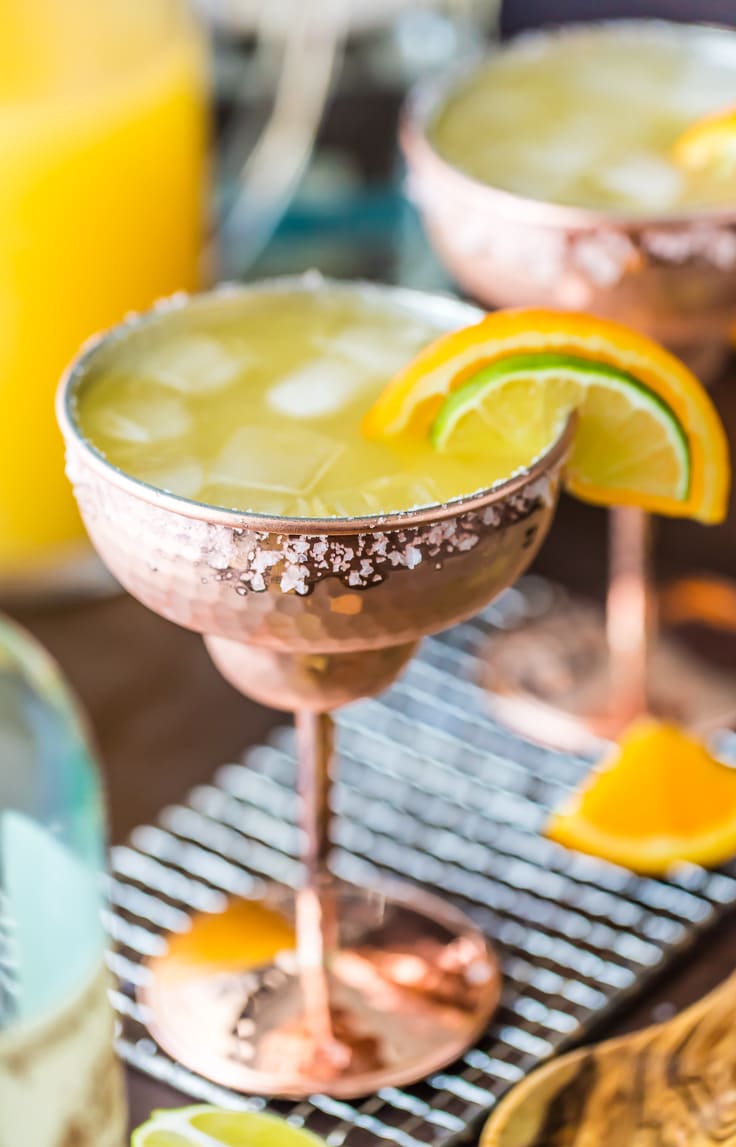 bronze margarita glass filled with white wine drink