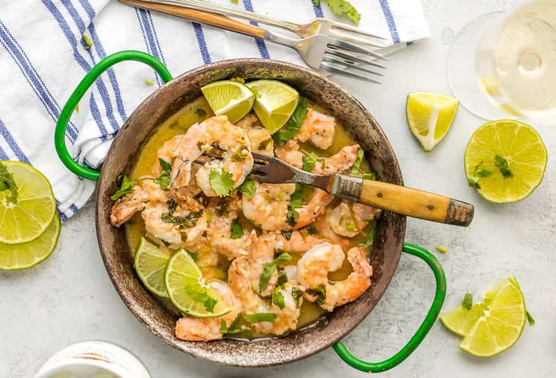 tablescape with a plate of cilantro lime shrimp scampi