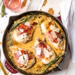 proscuitto wrapped sherry cream chicken in a skillet