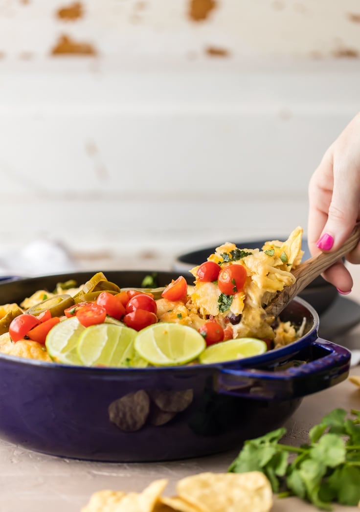 tex mex casserole topped with tomatoes