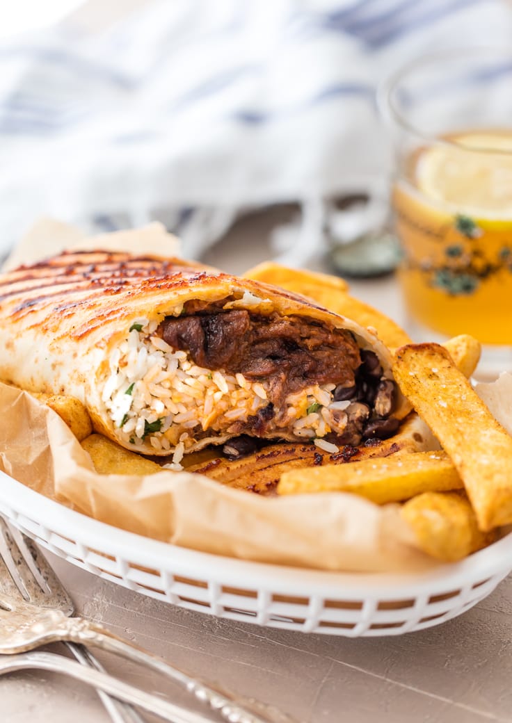 pulled beef burrito in a basket of fries