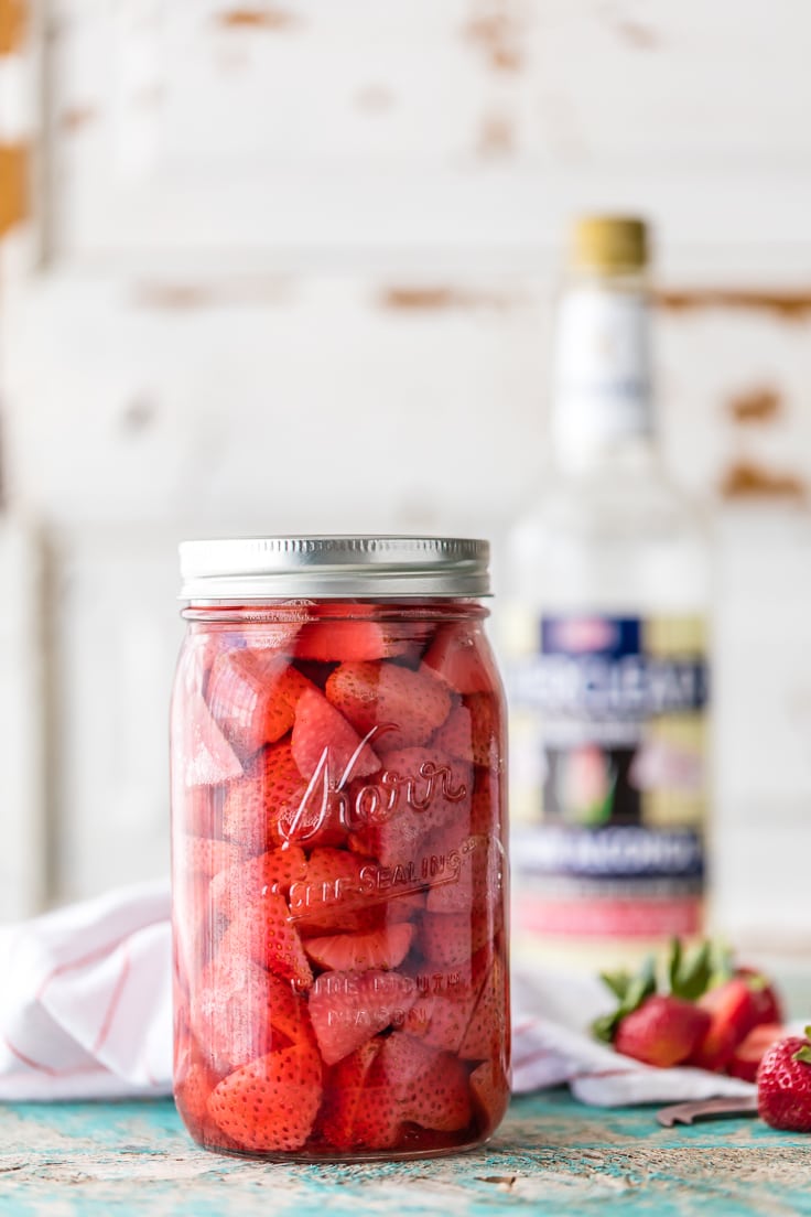 mason jar filled with sliced strawberries
