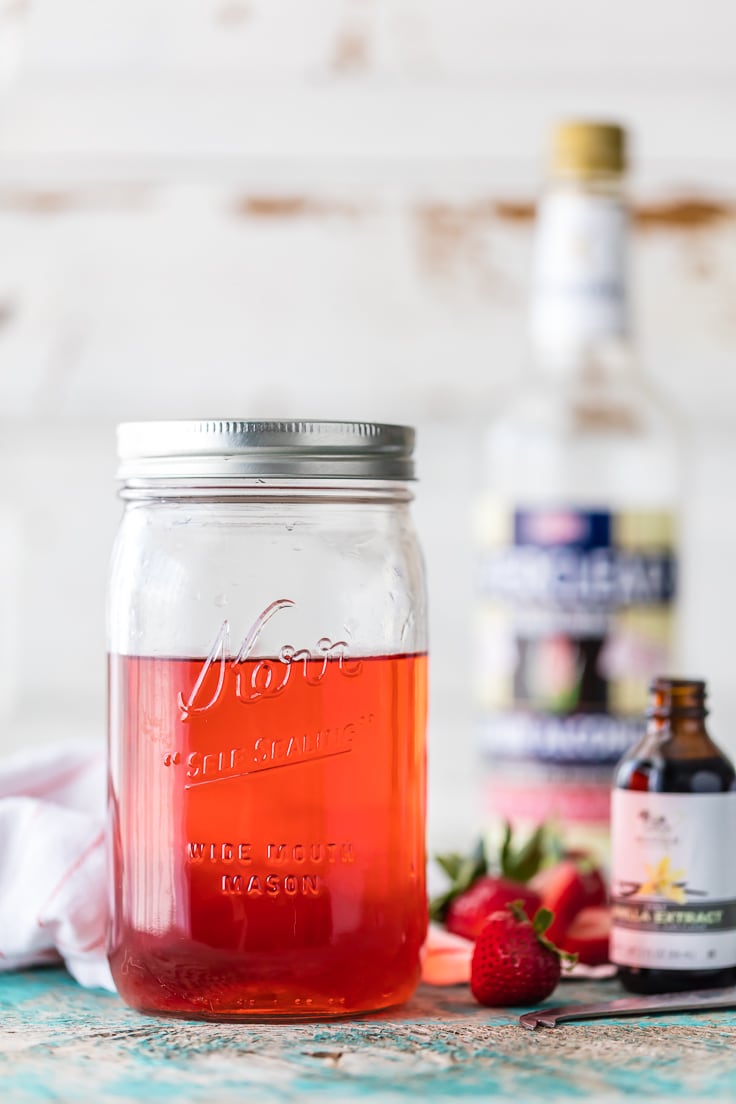 strawberry vodka in a mason jar