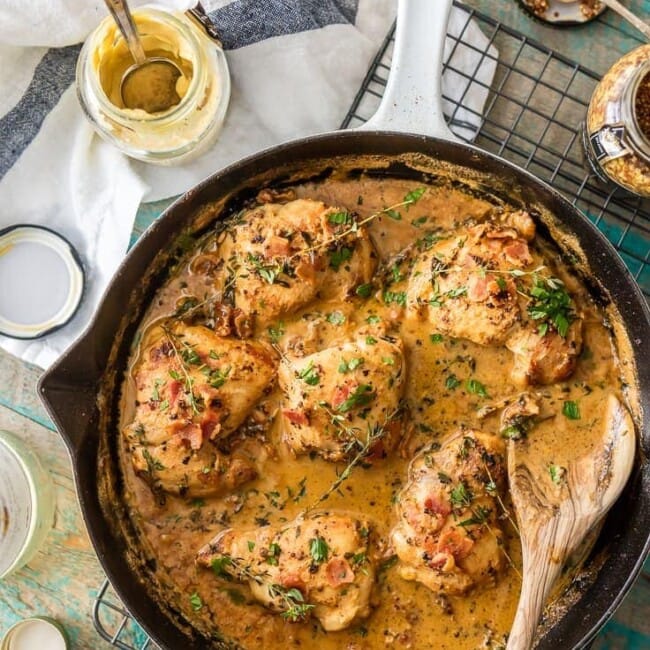 mustard chicken and bacon in a skillet