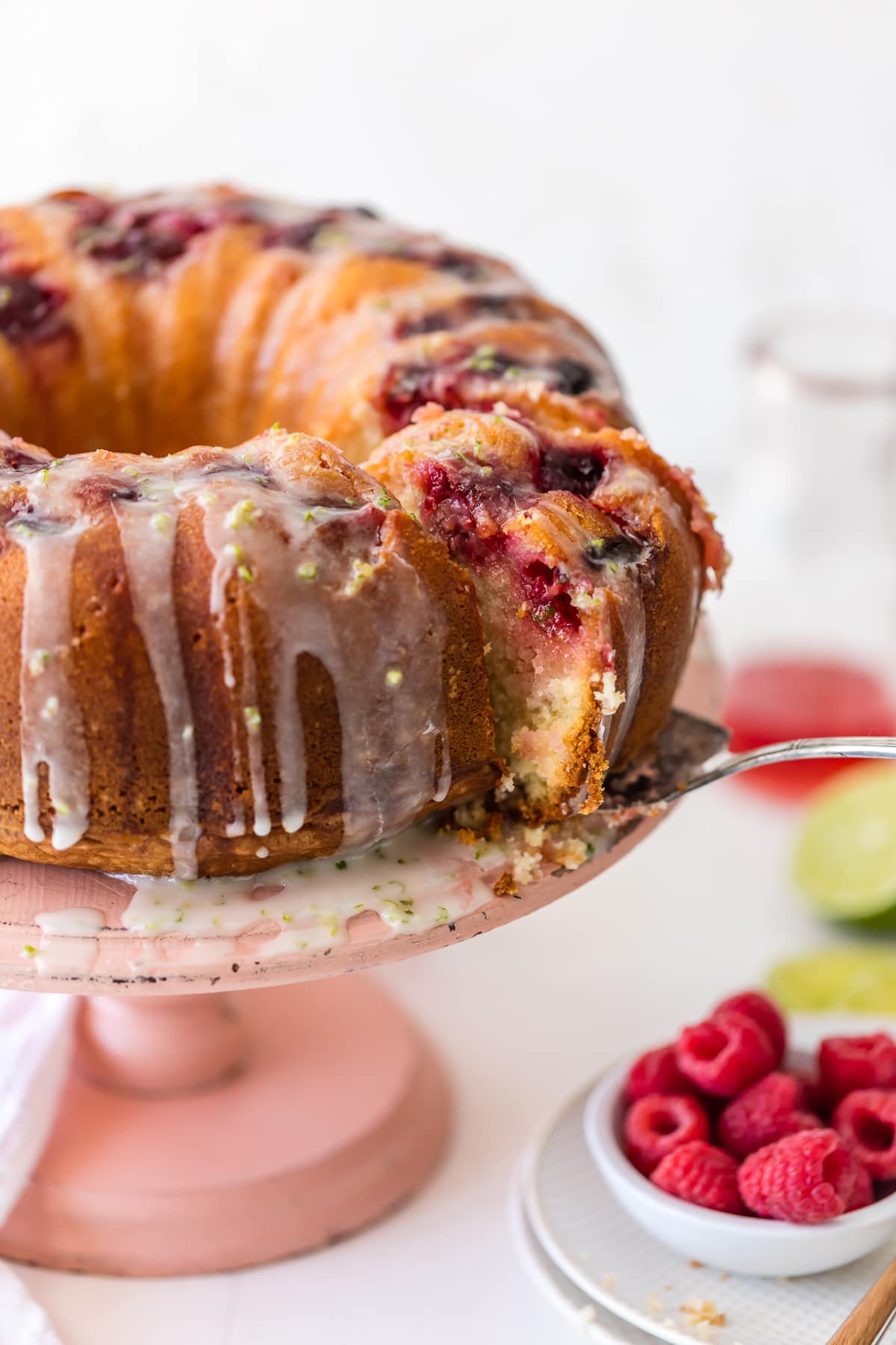 raspberry moscow mule cake topped with lime glaze