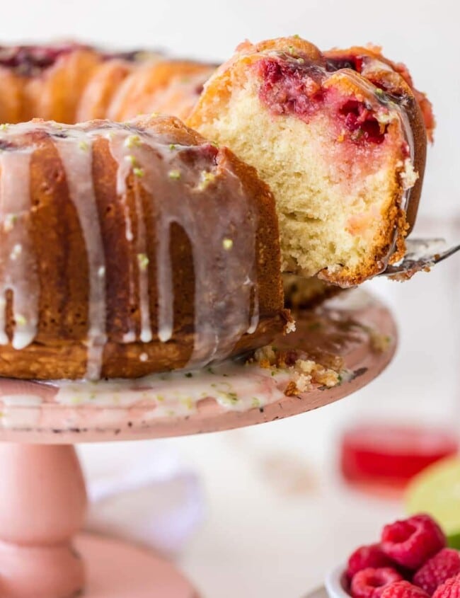 RASPBERRY CAKE makes life a little bit sweeter! This cake is inspired by one of my fave drinks, the Moscow Mule. It's made with fresh raspberries, ginger beer, a raspberry moscow mule simple syrup, and a fresh lime glaze.
