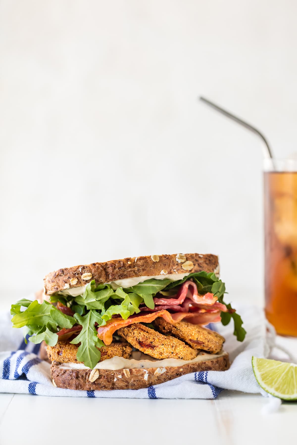 BLT recipe with fried tomatoes, arugula, and cilantro lime mayo