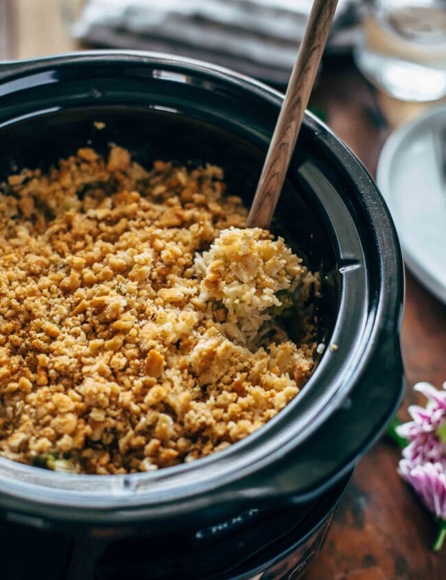 This Slow Cooker Velveeta Broccoli Rice Casserole is our go-to holiday side dish. Using a Crockpot is such an easy way to make cheesy broccoli and rice casserole. This Thanksgiving and Christmas favorite is easier than ever when made in a slow cooker!