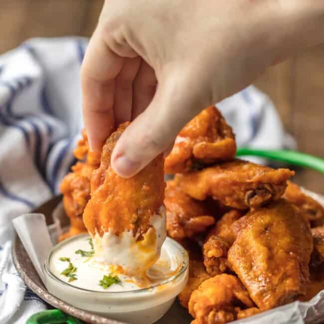 The BEST FRIED BUFFALO WINGS that just so happen to be GLUTEN FREE! Spicy deep fried buffalo chicken wings perfect for tailgating, the Super Bowl, and every day in between!