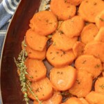 sliced candied sweet potatoes in a dish