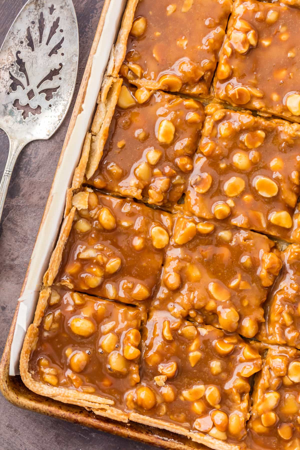Caramel Macadamia Nut Pumpkin Pie Bars recipe in a baking sheet