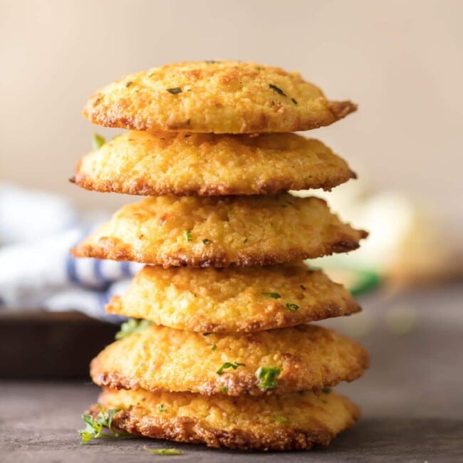 Cheesy Cornbread Drop Biscuits are EASY, delicious, and perfect for the holidays! These delicious garlic and cheese cornbread biscuits always make an appearance on our Thanksgiving and Christmas tables. This easy cornbread recipe can be made in no time with the help of cornbread mix and a few extra ingredients!