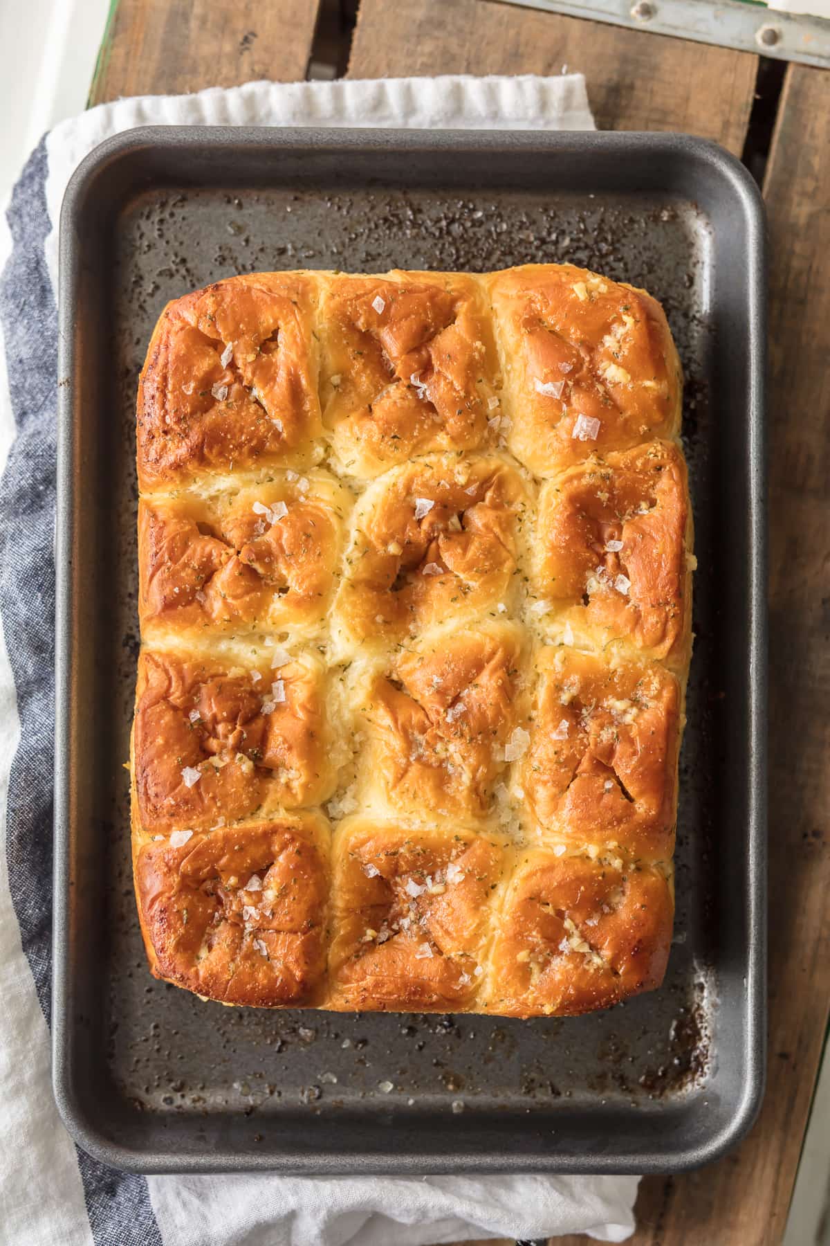 A baking tray with a load of King's Hawaiian Rolls on it