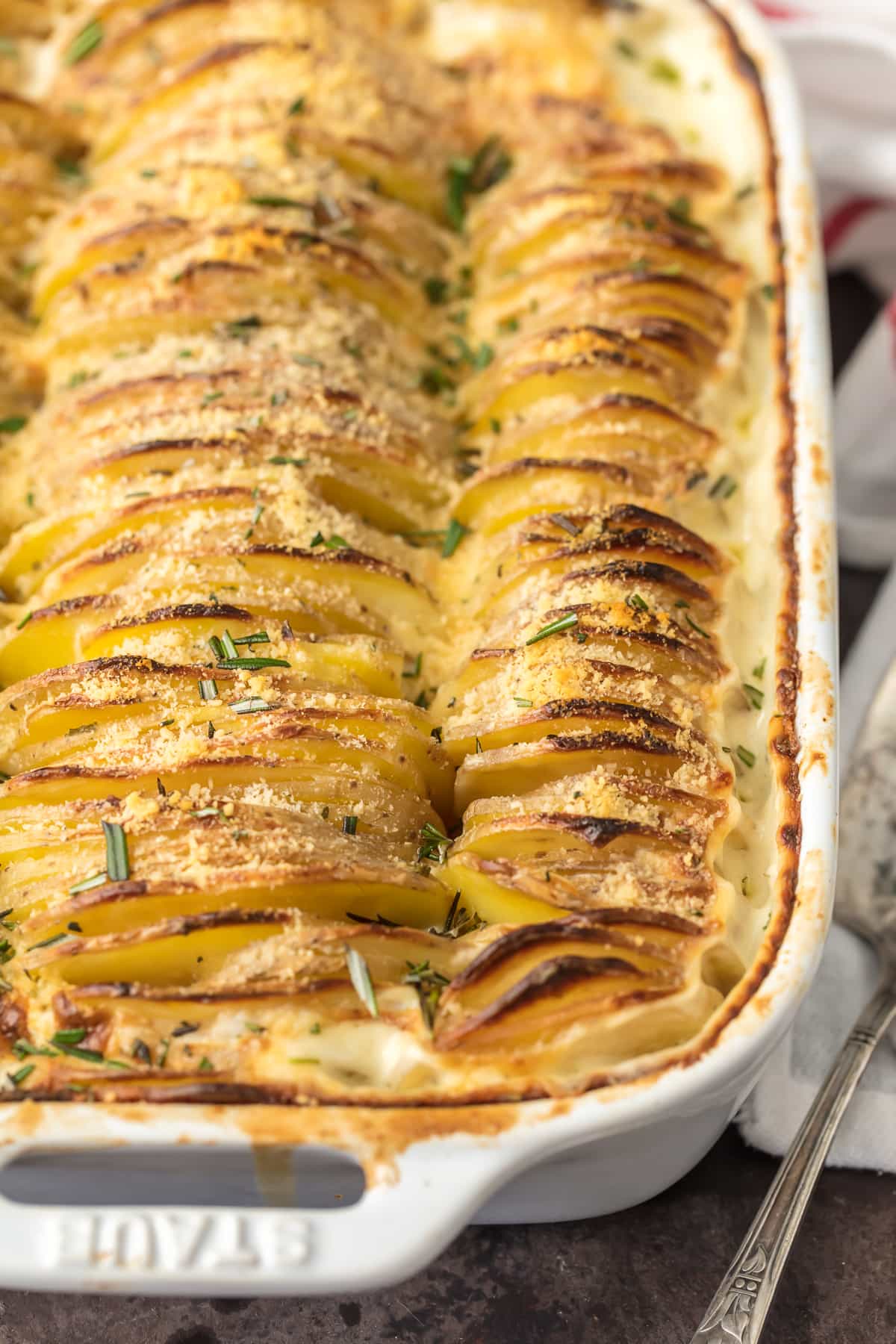 Creamy scalloped potatoes made with garlic herb cheese