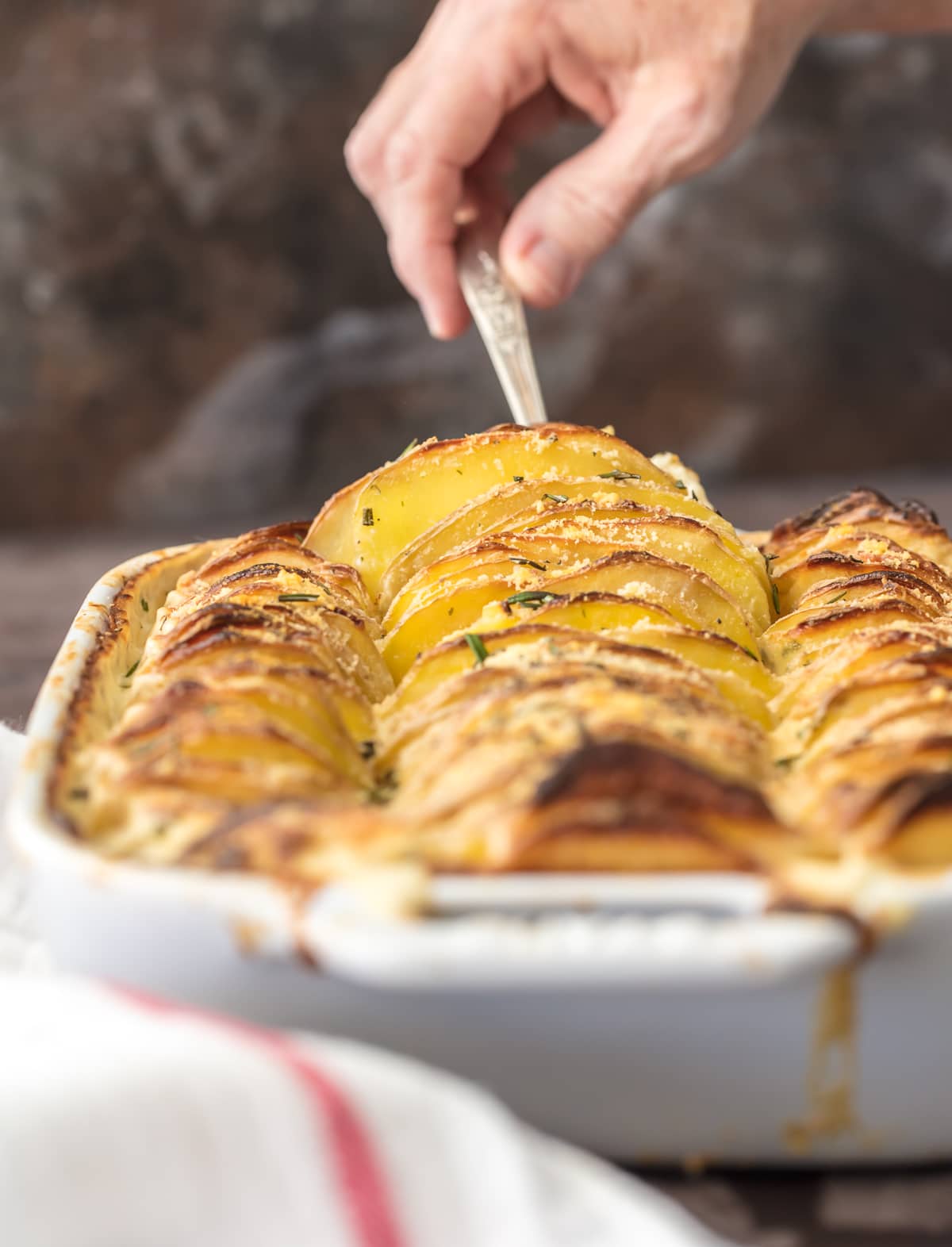 Creamy scalloped potatoes in a baking dish