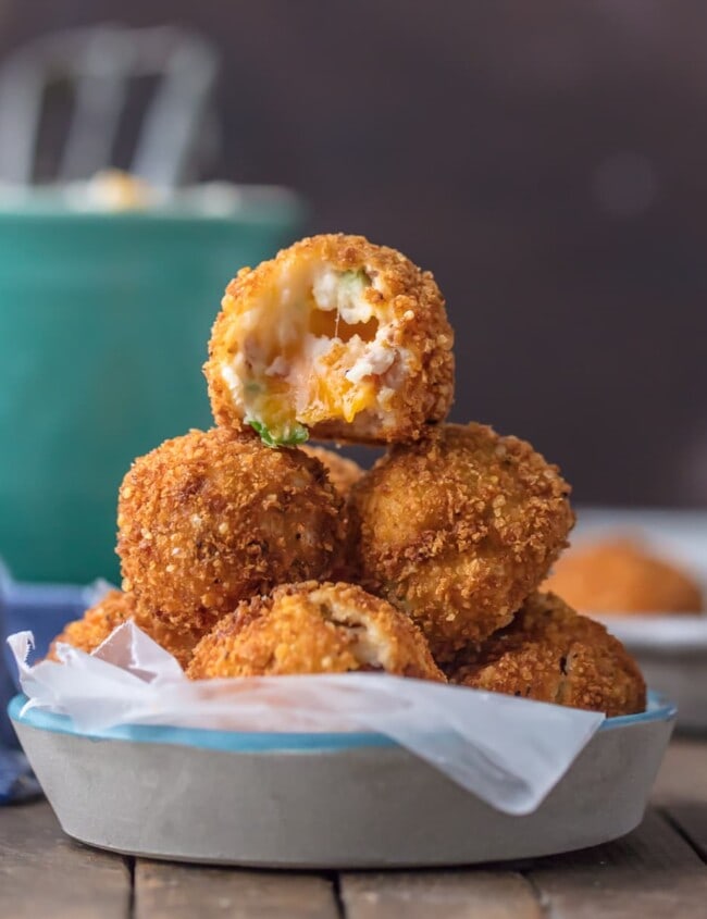 FRIED MASHED POTATO BALLS loaded with bacon, cheese, and onions are perfect for Thanksgiving leftovers! Put those leftover potatoes to good use and fry up some cheesy mashed potato bites. These loaded mashed potato balls make the ultimate appetizer or side dish!