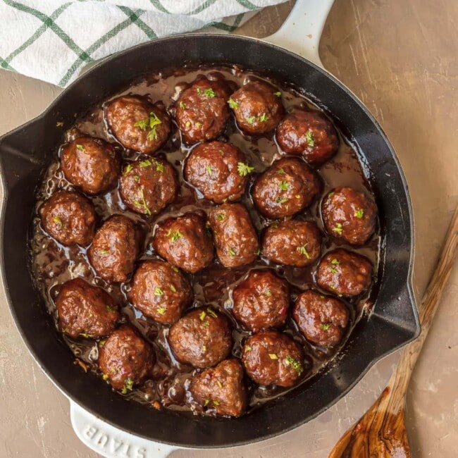 COCKTAIL MEATBALLS are the best holiday appetizer! These sweet and spicy Cranberry Meatballs are cooked in a cranberry pepper jelly sauce, which gives them the perfect kick of flavor. These cranberry sauce meatballs are just so delicious! The best Thanksgiving, Christmas, or New Years Eve appetizer without a doubt.