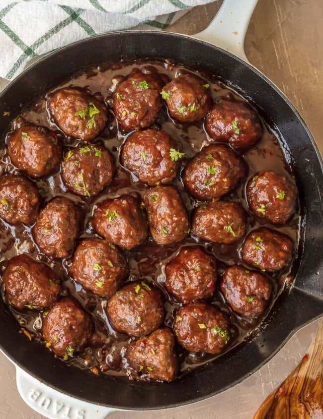 COCKTAIL MEATBALLS are the best holiday appetizer! These sweet and spicy Cranberry Meatballs are cooked in a cranberry pepper jelly sauce, which gives them the perfect kick of flavor. These cranberry sauce meatballs are just so delicious! The best Thanksgiving, Christmas, or New Years Eve appetizer without a doubt.