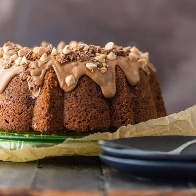 CHOCOLATE PEANUT BUTTER CUP POUND CAKE is the ultimate bundt cake recipe! Topped with a decadent peanut butter icing, this indulgent cake is perfect for the holidays!