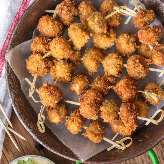 fried blue cheese stuffed olives on a plate