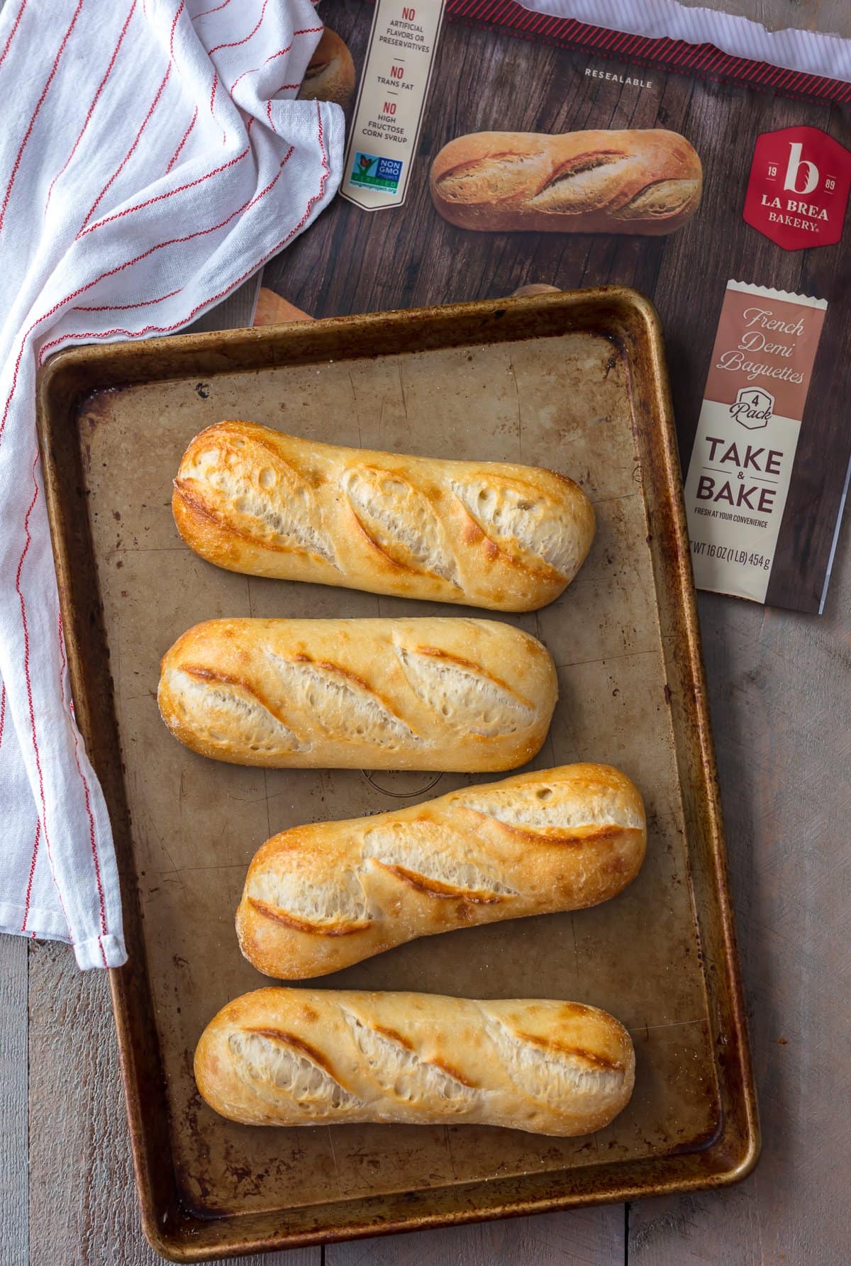 French bread baguettes on a baking tray