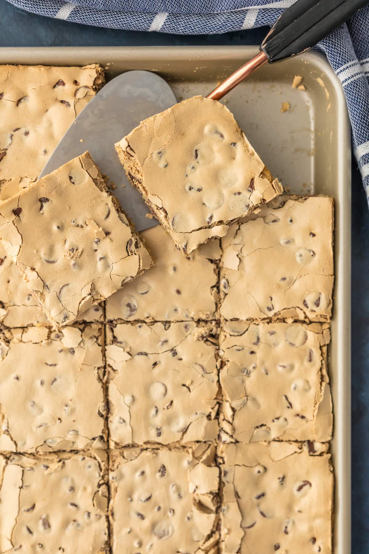 Baking tray filled with chocolate chip cookie bars