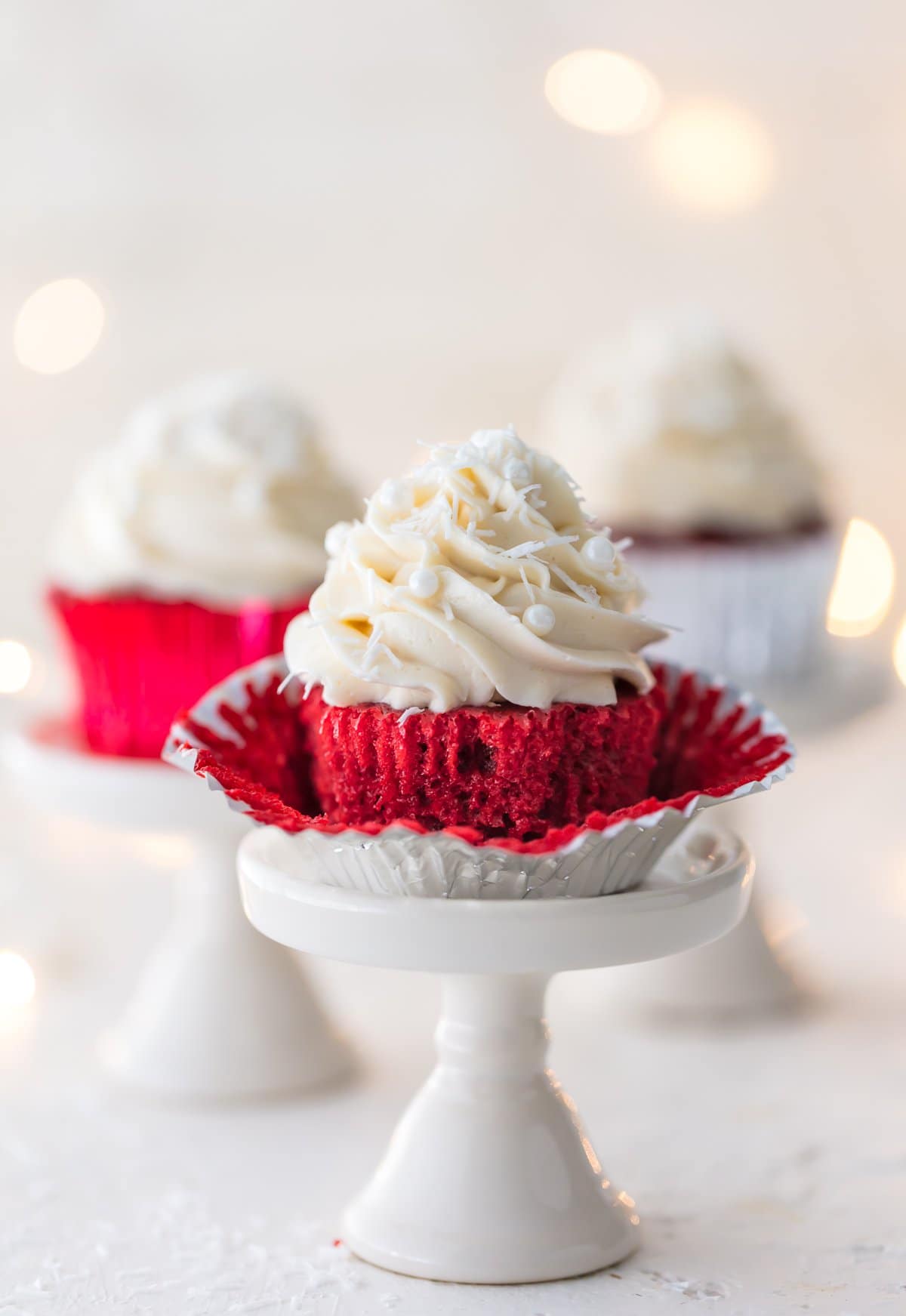 PERFECT RED VELVET CUPCAKES are the ultimate holiday dessert! You haven't lived unless you've tried these classic cupcakes with the most amazing cream cheese icing! Classic, delicious, and perfect.