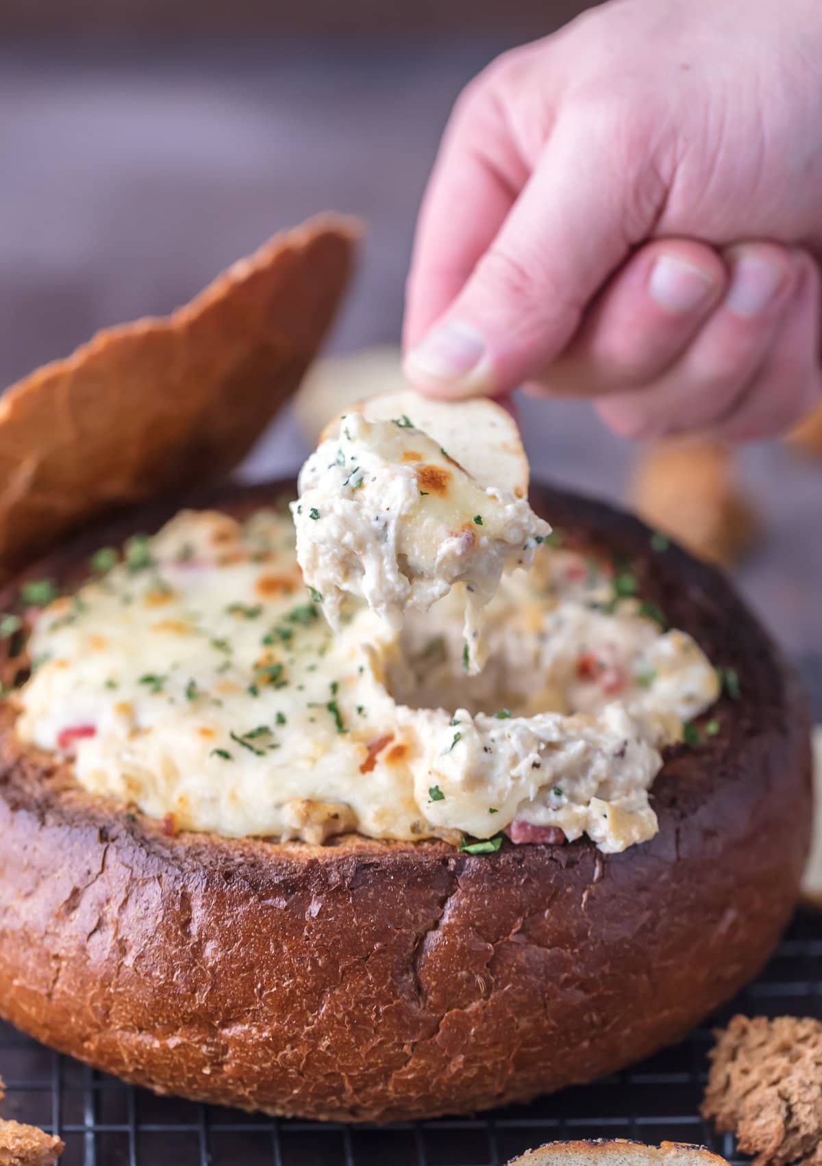 Crab Artichoke Dip in a Bread Bowl (Video) - The Cookie Rookie