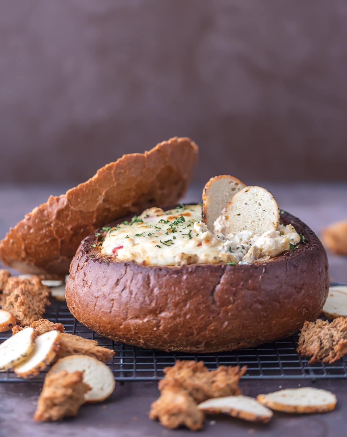 Crab and artichoke dip in a bread bowl