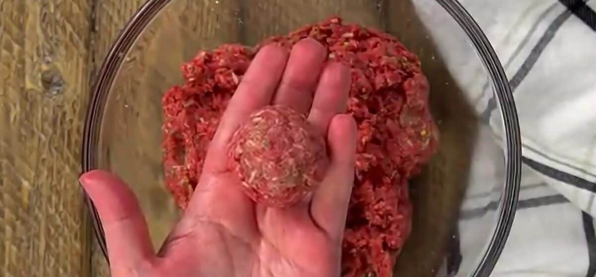 Making the meatballs for the soup. 