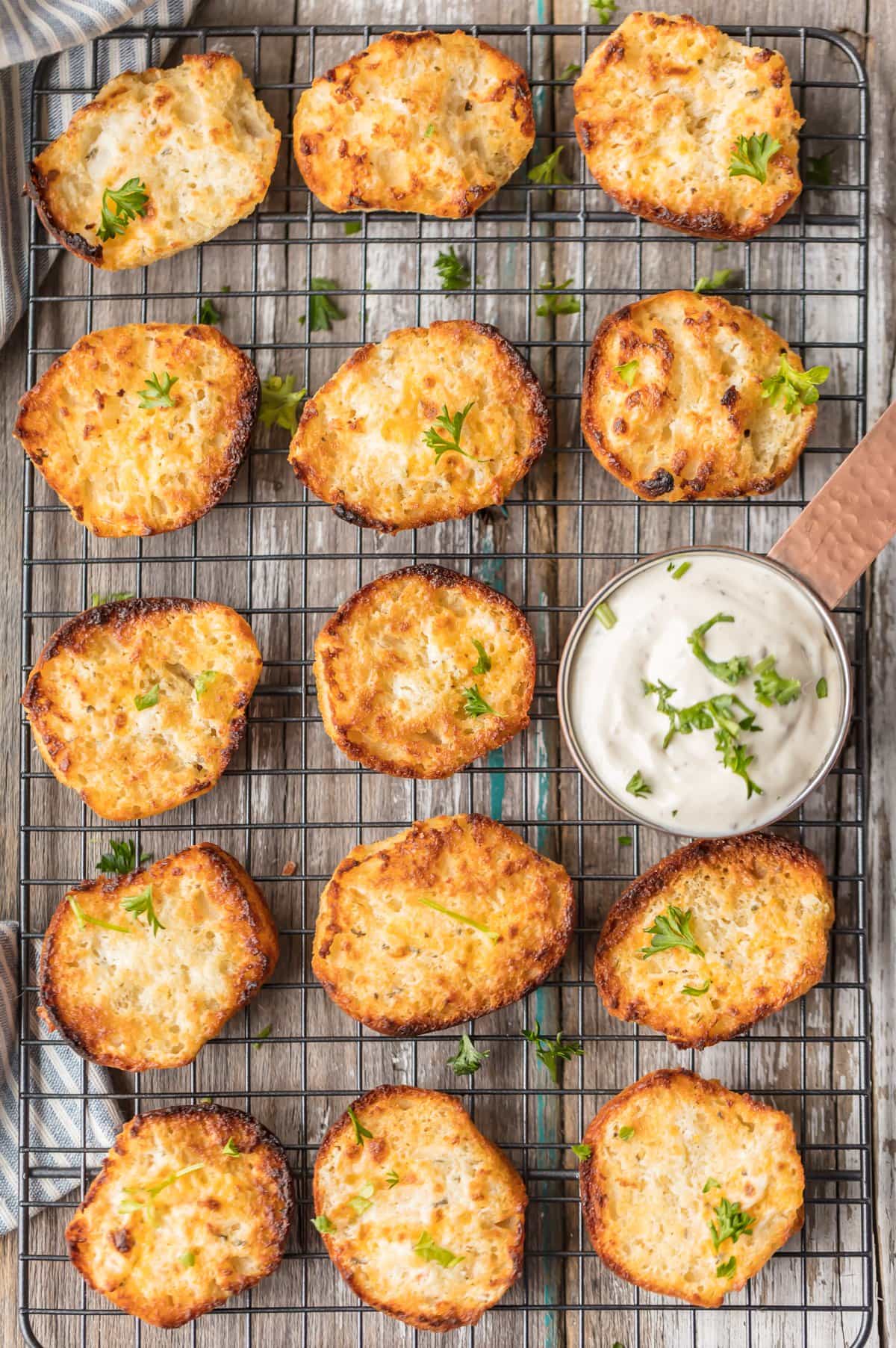 ranch dip biscuits on a cooling rack with ranch dip