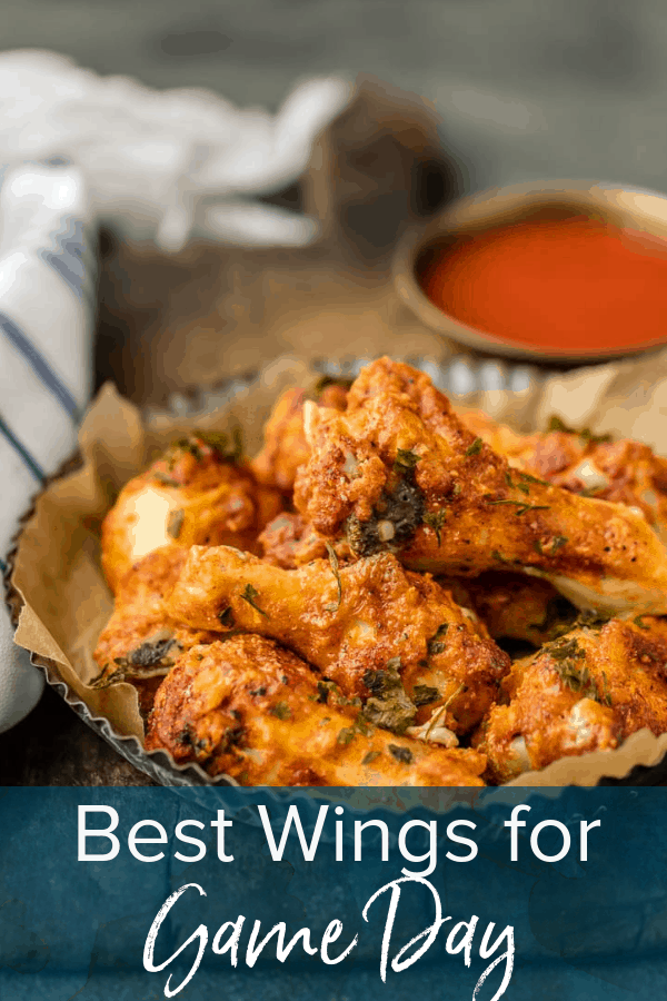 photo of chicken wings with text overlay. text reads: Best Wings for Game Day