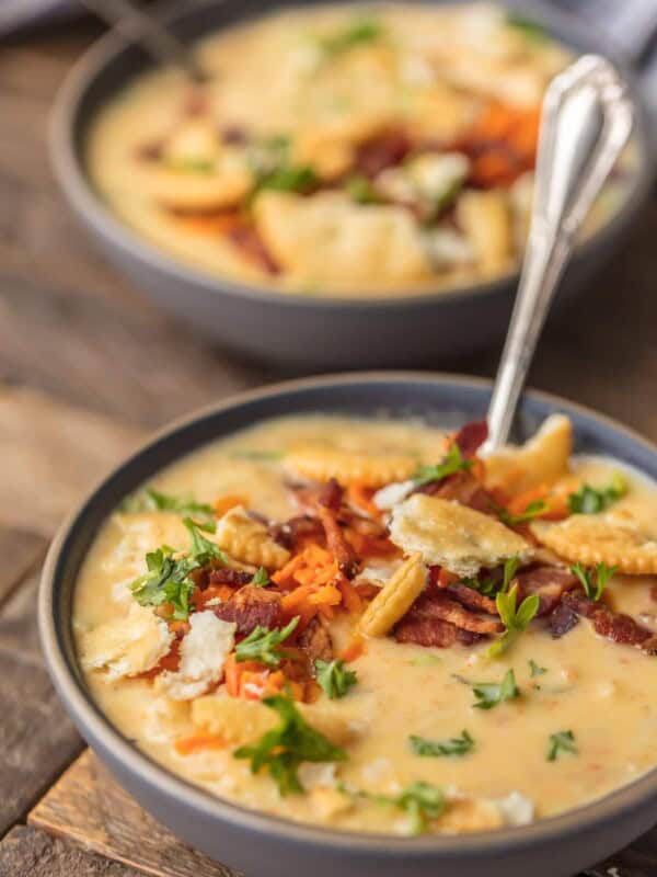 This HASH BROWN POTATO CHEESE SOUP is an absolute Winter MUST MAKE! The ultimate comfort food soup made in minutes. So cheesy and delicious. Topped with sauteed carrots and bacon for extra flavor!
