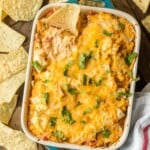 KING RANCH CHICKEN DIP is a fun twist on a classic family favorite casserole. The flavors including chicken, rotel, cheese, and tortillas lend themselves easily to a delicious dip, just perfect for the Super Bowl!