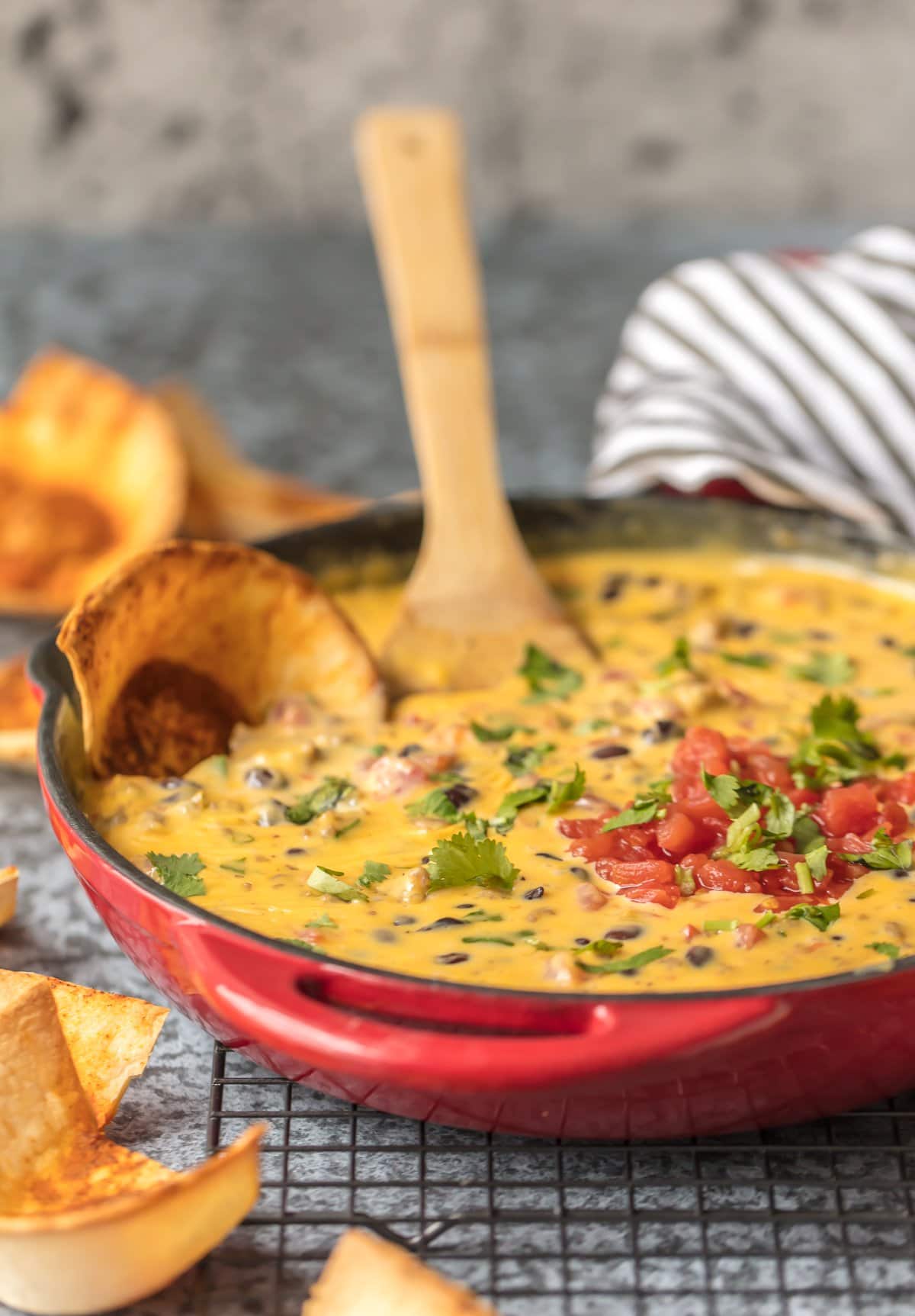 A skillet filled with velveeta queso dip