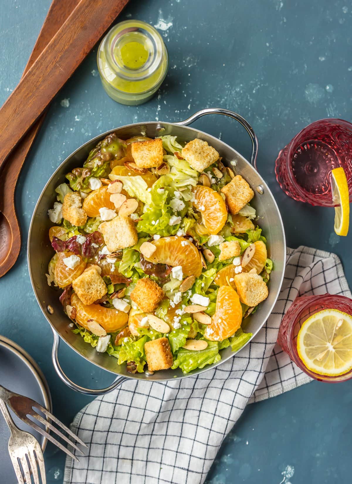 Orange Salad topped with croutons, mandarin oranges, feta, almonds, and more