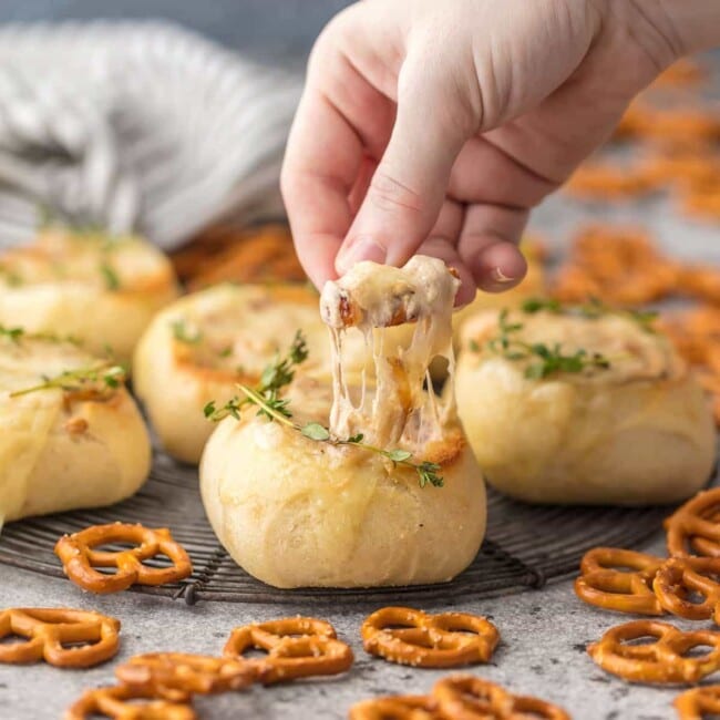 FRENCH ONION DIP is a classic appetizer that should be present at every party. We made this dip even more fun by making it in mini bread bowls! Making bread bowls with fresh rolls is easy, and it makes the perfect appetizer for the Super Bowl.