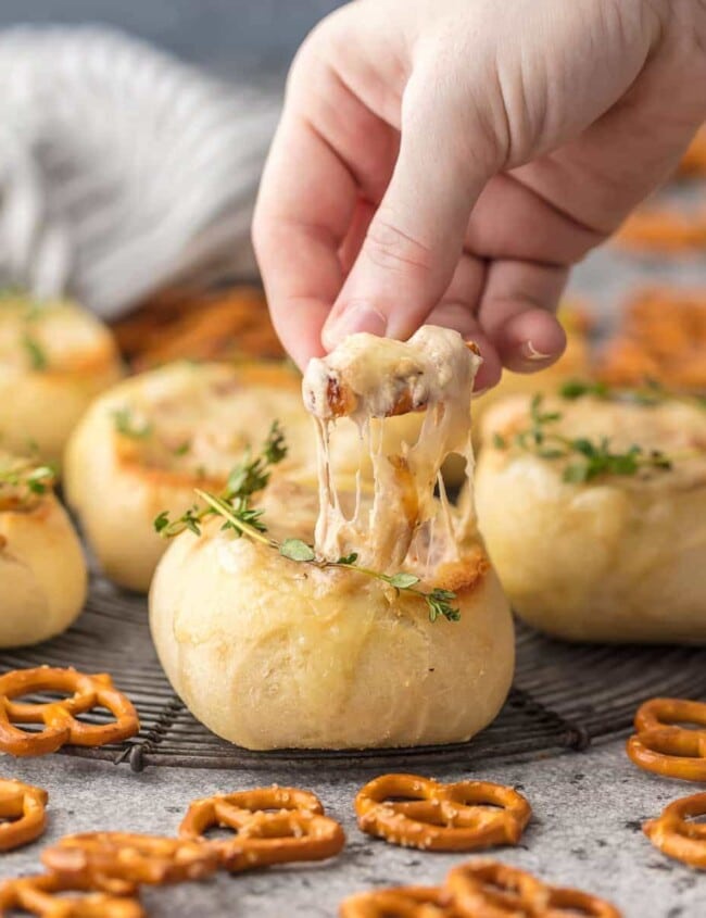 FRENCH ONION DIP is a classic appetizer that should be present at every party. We made this dip even more fun by making it in mini bread bowls! Making bread bowls with fresh rolls is easy, and it makes the perfect appetizer for the Super Bowl.
