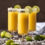 tropical mimosas in champagne flutes