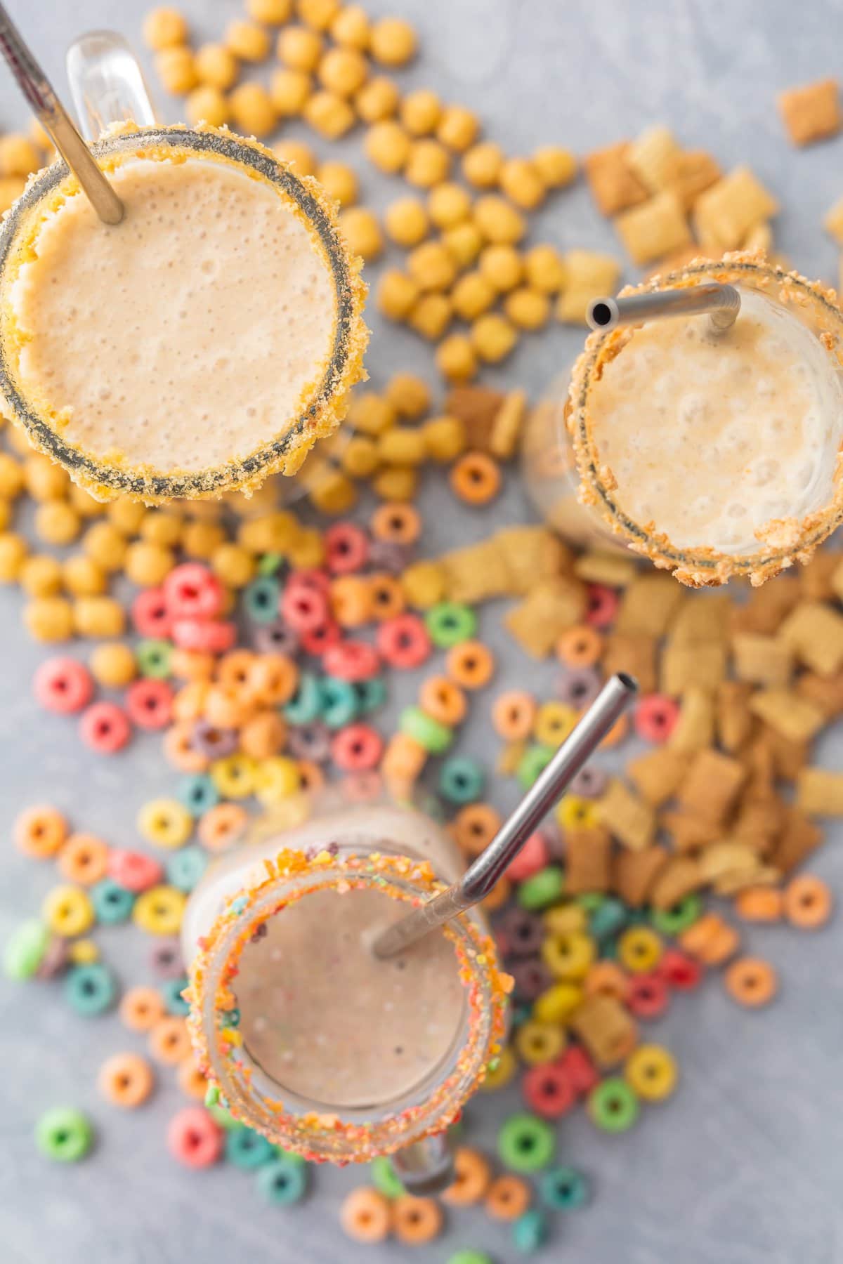 Cereal Milk Breakfast Smoothies surrounded by cereal